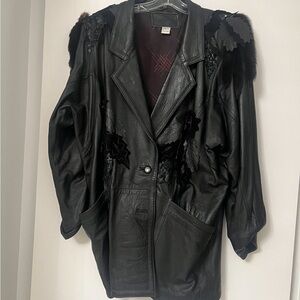 Black Leather Jacket with Voluminous Shoulders and Notched Lapel